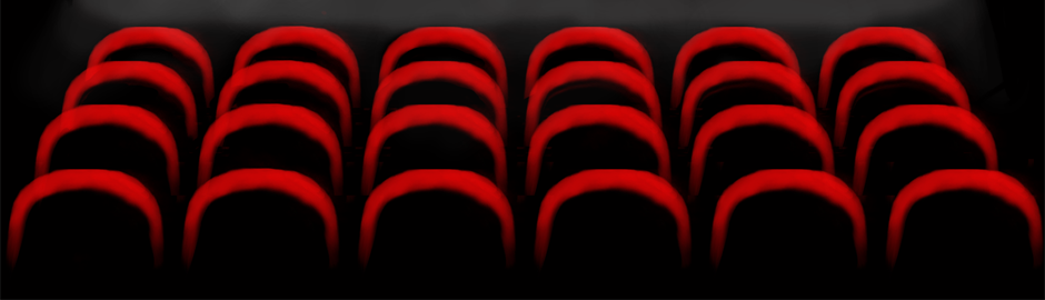 Grafika przedstawiająca czerwone fotele na sali kinowej.